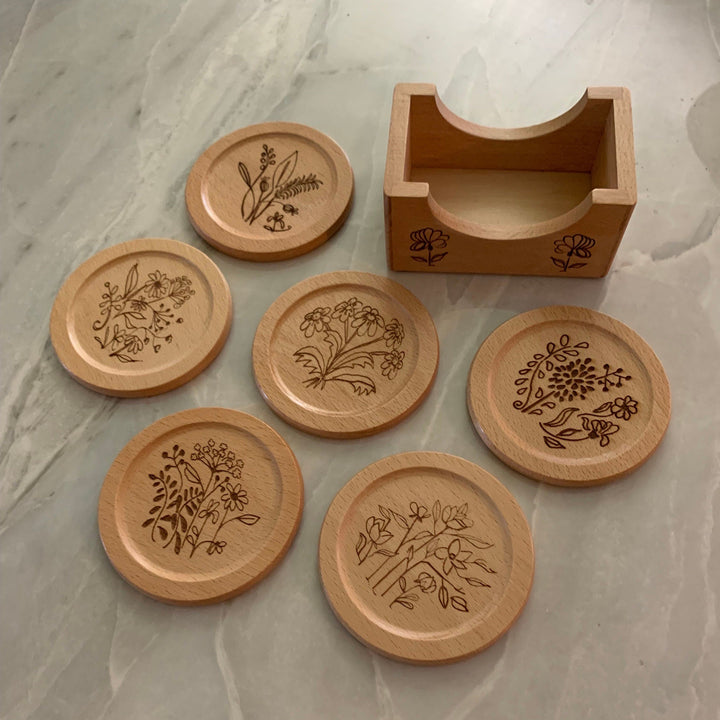 Wildflower Coasters (6) Designs are all different. They match my Glass Can designs. Laser burned. Bamboo. Great for cocktail parties.