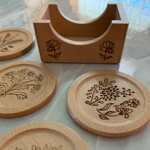 Wildflower Coasters (6) Designs are all different. They match my Glass Can designs. Laser burned. Bamboo. Great for cocktail parties.