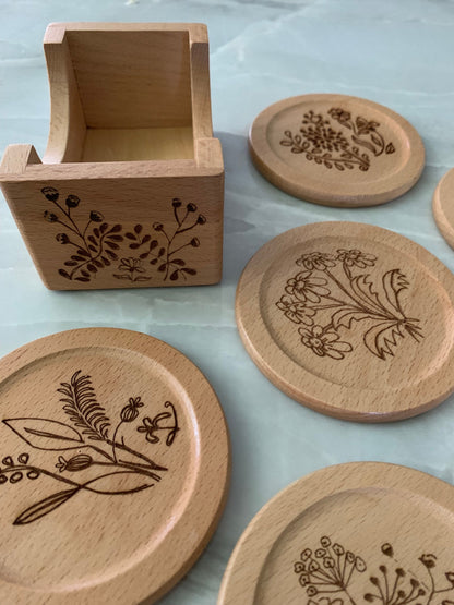 Wildflower Coasters (6) Designs are all different. They match my Glass Can designs. Laser burned. Bamboo. Great for cocktail parties.