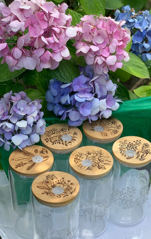 Glass Drinking Jar Bamboo Lid Highlighted With Lavender and Pink Hydrangeas Wildflower Design Kitchen  Container Etched Glass Pattern Botanical Engraving Natural Material Eco Friendly Pantry Solution Beautiful Decorative Jar Functional Glassware Favorite Beverage