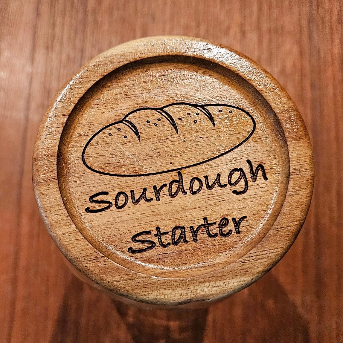 Acacia Wood Sourdough Starter Lid Mason Jar Cover Bread Baker Gift Kitchen Fermentation Supplies Wood Burned Design Artisan Crafted Detail Wide Mouth Regular Mouth Sizes Available Breathable Lid Prevents Starter Loss Natural Wood Kitchen